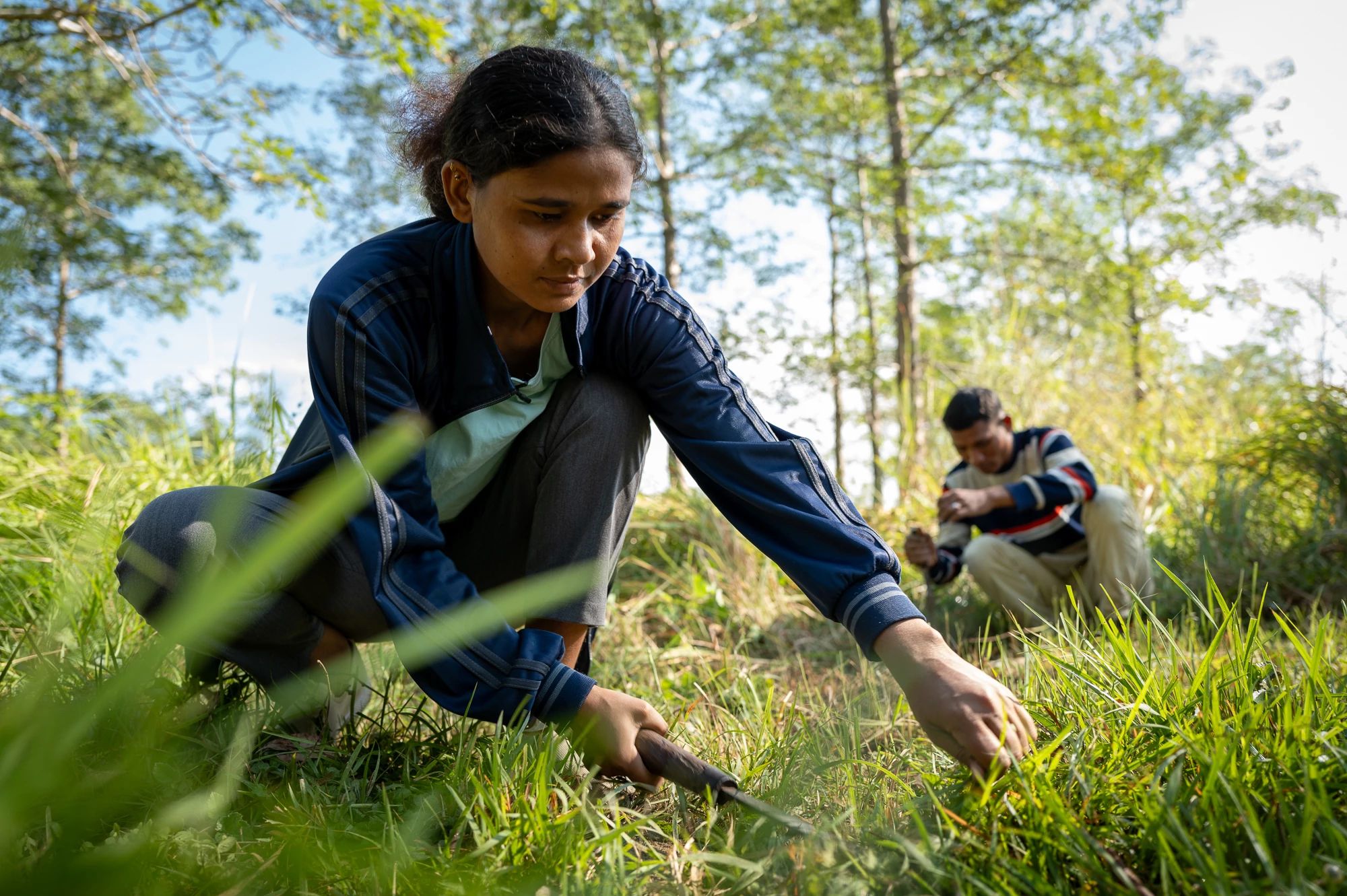 A woman planting crops