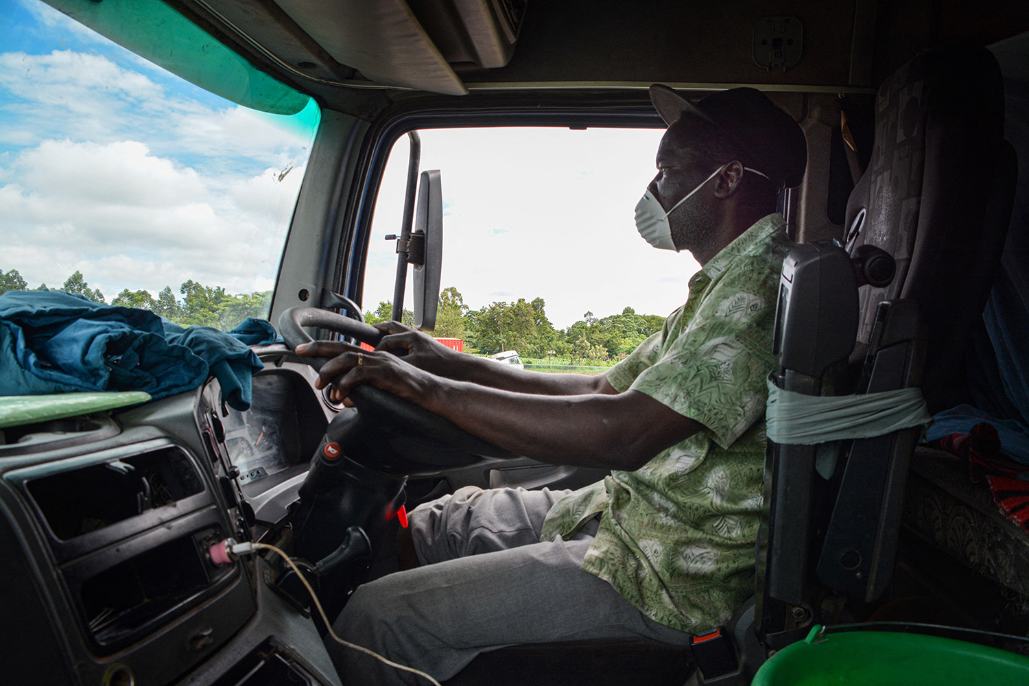 A man driving a truck.