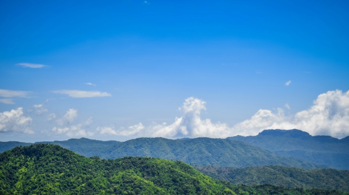 A view of a mountain range from a distance.